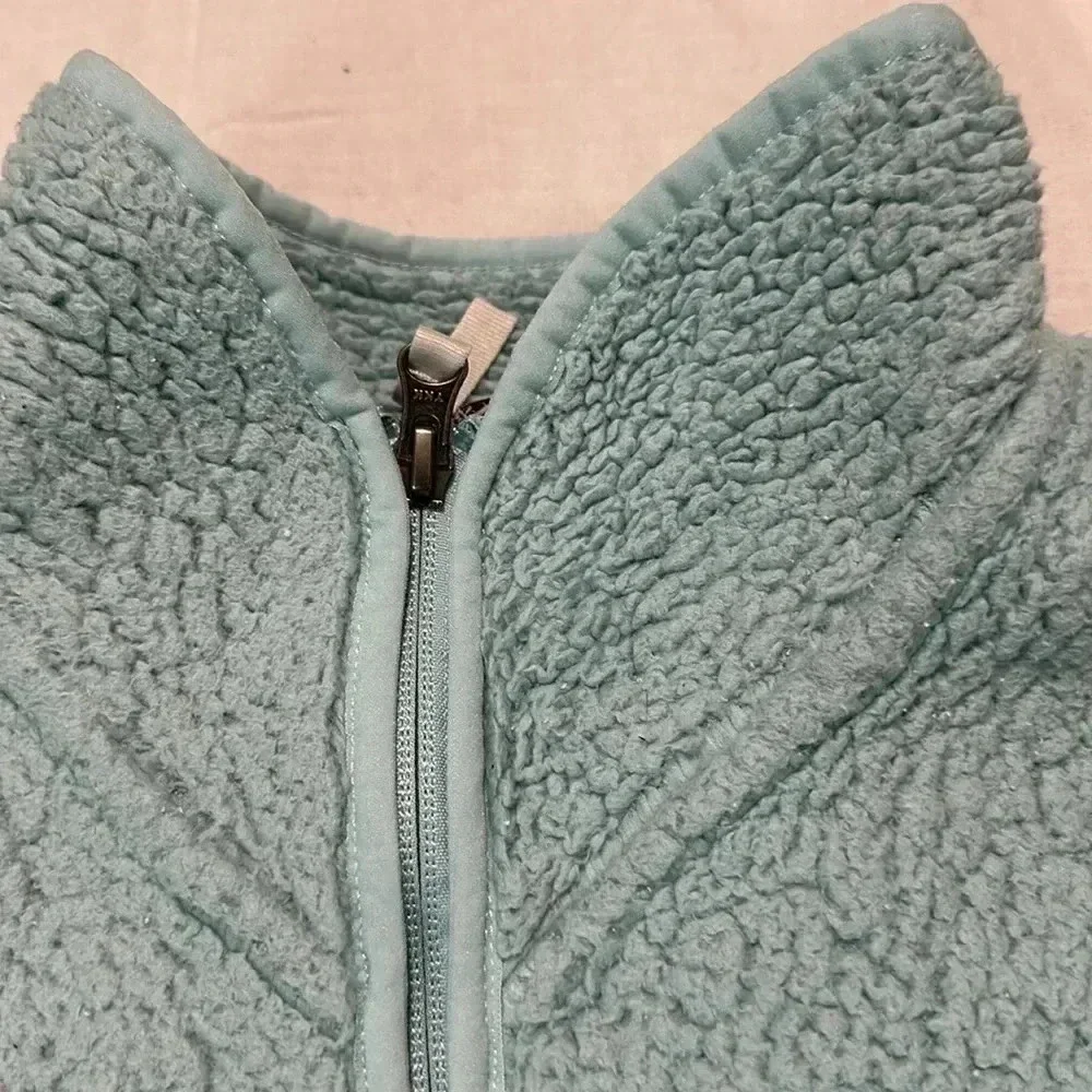 The North Face girls light blue fleece full zip jacket size M 10-12